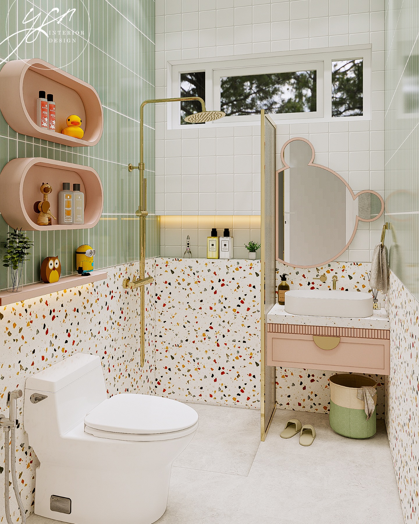 Peach vanity with bear-ear shaped mirror, sage green vertical tile walls, confetti terrazzo wainscot, pink arched wall nooks, and brass fixtures in a kids' bathroom